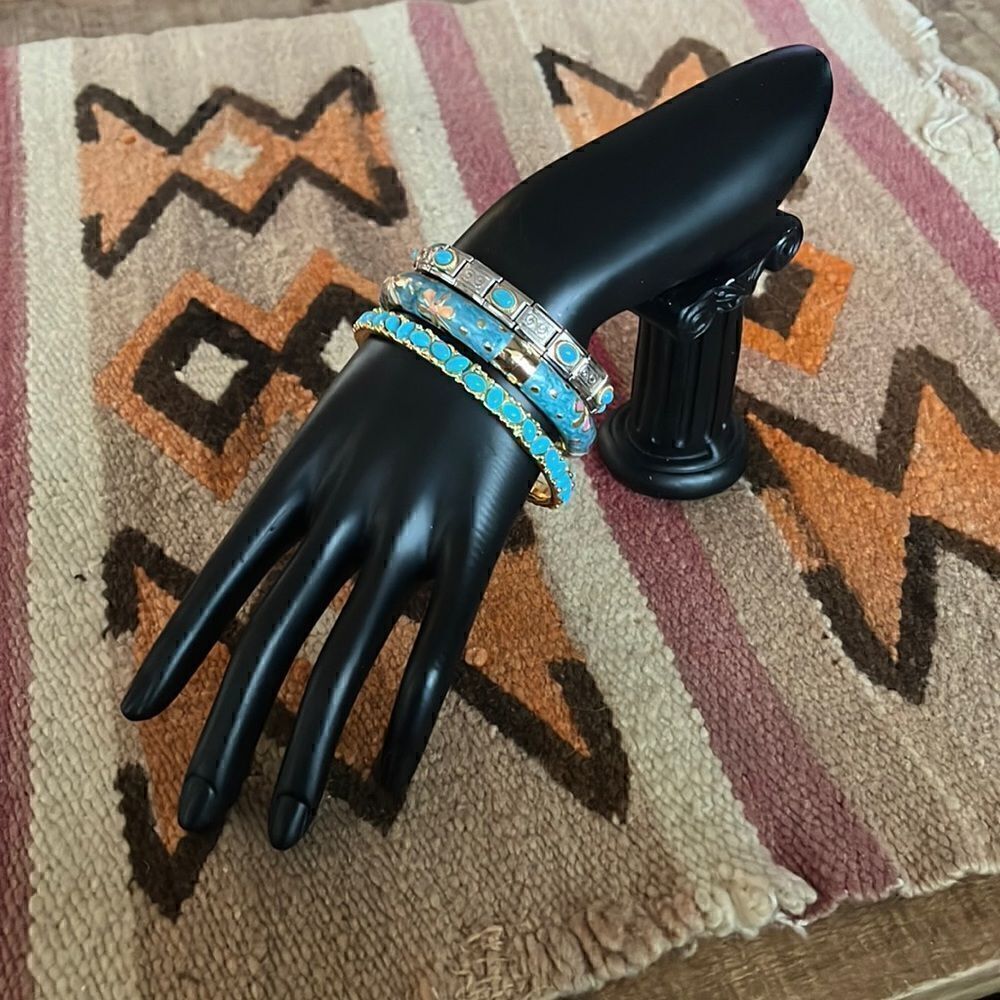 Lot of three costume jewelry bracelets with gold, silver, and turquoise tones